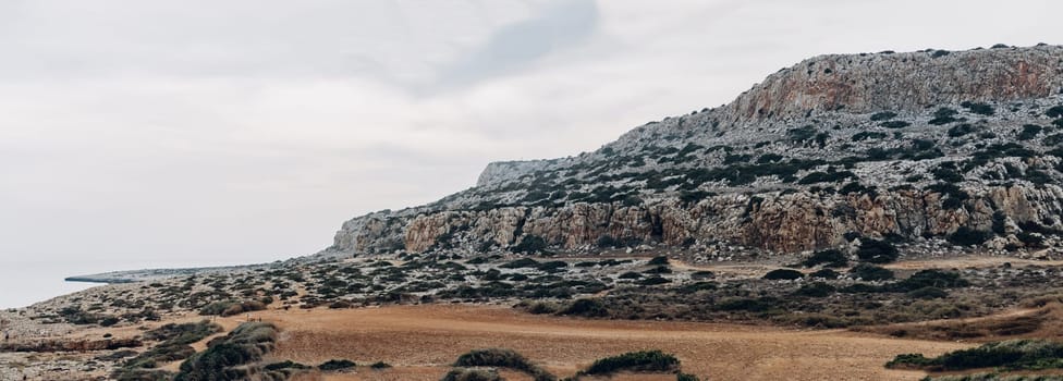 Rocky coastline of Cyprus beach, panoramic landscape of Cape Greco National Park