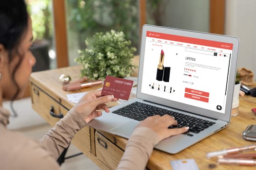 Woman shopping online on internet marketplace browsing for sale items for modern lifestyle and use credit card for online payment from wallet protected by crucial cyber security software