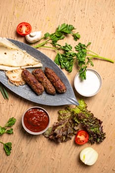 Middle Eastern lamb skewers marinated lamb meat grilled on skewers with vegetables and herbs, a delicious BBQ option.