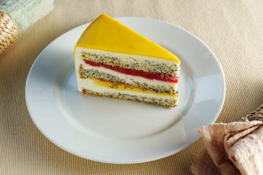 Indulge in the delectable sight of a scrumptious slice of cake gracefully placed on a pristine white plate.