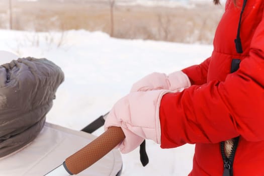 Winters Tender Care: A Mothers Walk With Her Child in the Snow