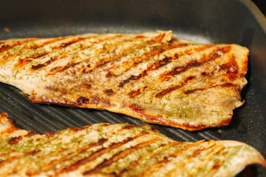 Grilled Salmon Fillets Perfectly Charred on the Grill. Selective focus