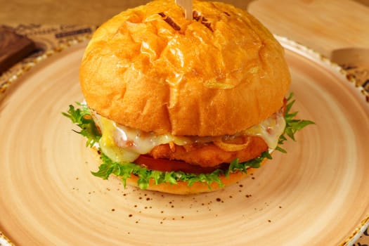 Cheeseburger With Lettuce and Tomato on Bun, close up