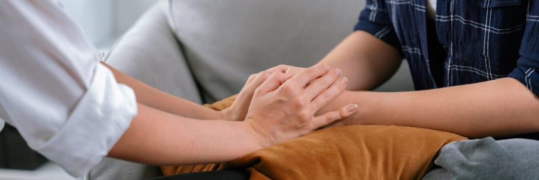 Close up shot of supportive and comforting hands for cheering up depressed person or stressed mind with utmost empathy