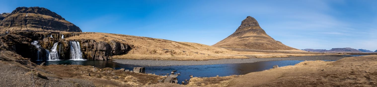 Panoramic view of Kirkjufell and its waterfalls in Iceland