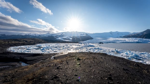 Panoramic view of melting ice on Jokulsarlon glacier in spring