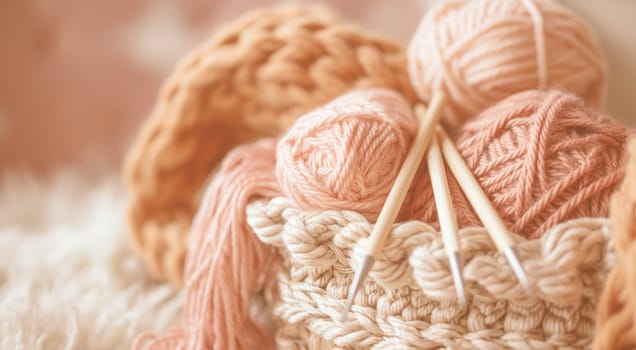 Knitting needles and yarn balls in basket with soft focus. High quality photo