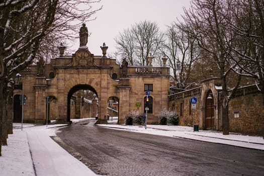 Fulda, Germany - Dezember 25, 2021 the first Christmas day after corona pandemic time - Paulus gate and Pauluspromenade on a cloudy winter day. High quality photo