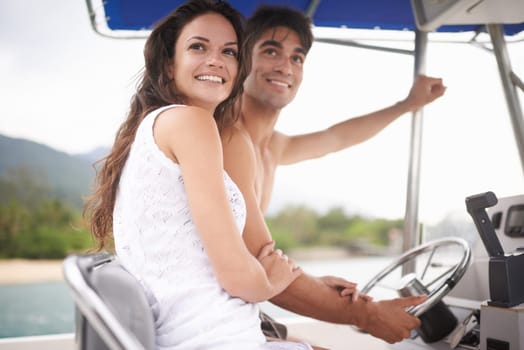 Couple, boat and driving or travel holiday or explore sea on vacation adventure in Hawaii, view or steering wheel. Man, woman and happy in paradise or outdoor journey on coast, transportation or trip.