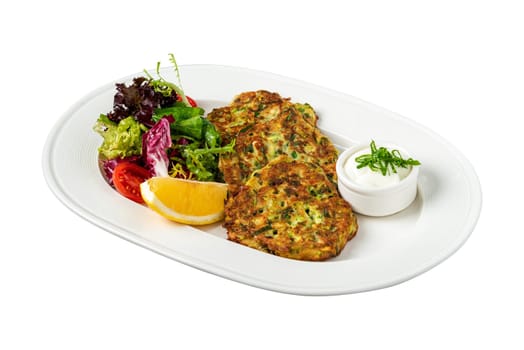 MUCVER. Traditional Turkish Zuccini Mucver. Mucver is a Turkish fritter or pancake, made from grated zucchini.