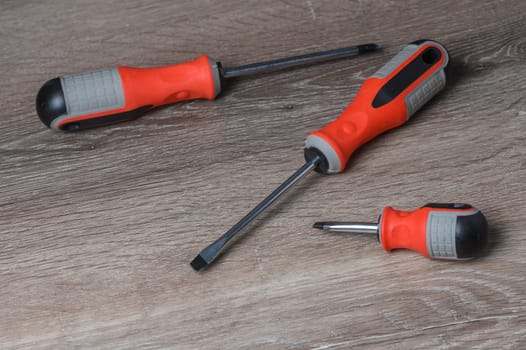 screwdrivers on a wooden table 3