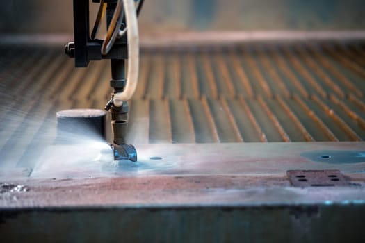 Image of effective method cutting metal - waterjet, close-up