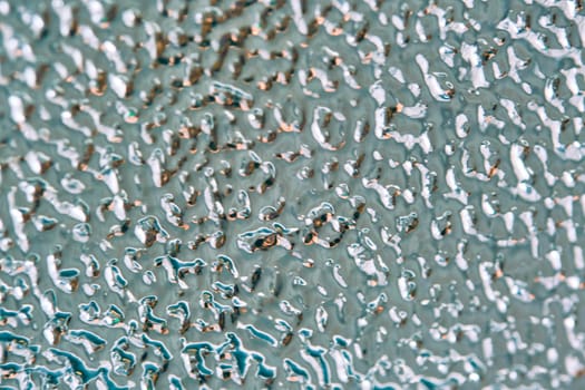 Silver foil texture. macro photo. general plan.