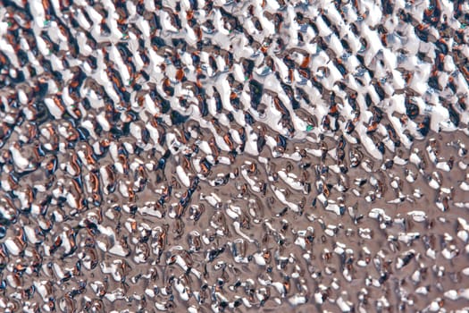 Silver foil texture. macro photo. general plan.