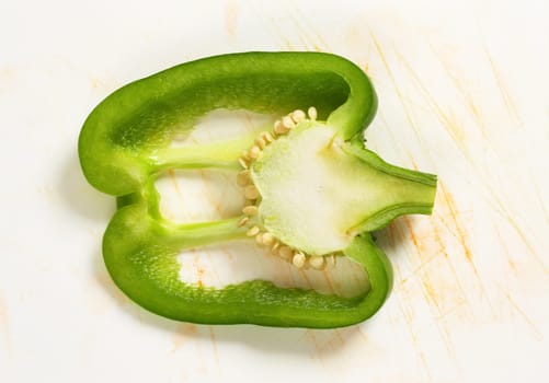 Thin slice of green bell pepper (cross section)