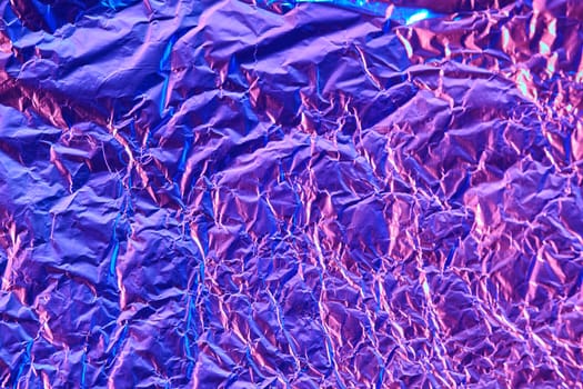 texture of mint foil in purpure light