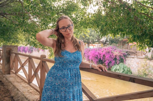 Woman sits on the bench in Alanya city, Turkey. Travelling or vacation concept