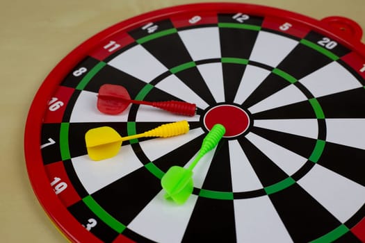 Magnetic board with special darts target, plastic darts with a magnet for throwing and scoring in sports