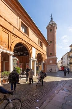 Comacchio, Italy. February 25, 2024.  view of the ancient clock tower in the center of the town