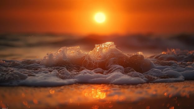 A sunset over the ocean with waves crashing on shore