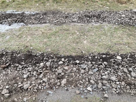 Construction of road filling the with gravel