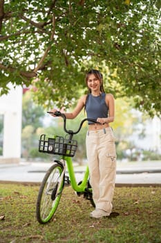 Smile asian woman lifestyle using bike in summer travel, ECO friendly.