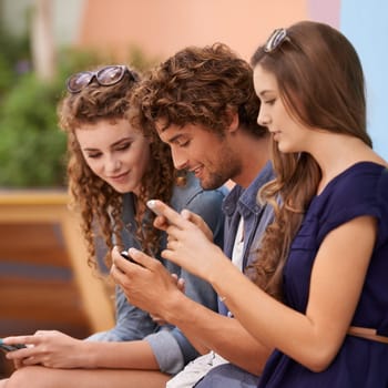 Friends, outdoor and relax or cellphone on internet, campus and scroll on social media for update. Students, talking or mobile app at university for online research or bonding together for networking.