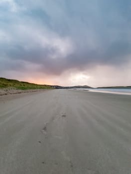 Dramatic clouds above Narin Strand, a beautiful large blue flag beach in Portnoo, County Donegal - Ireland