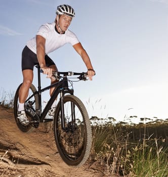 Man, bike and countryside for workout, off road and cycling for health and wellness. Athlete, bicycle and training for nature, transportation and exercise with cape town mountain trail for fitness.