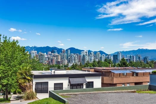 View over high-rise buildings in downtown from residential area in Vancouver, Canada.