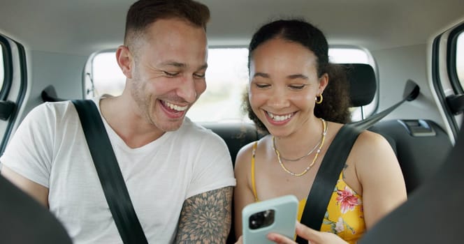 Couple of friends, phone and car for road trip information, location search and social media. Happy man and woman on mobile app talking of travel, holiday and transportation service with funny chat.