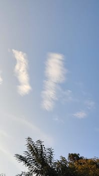 Blue light sky nature white clouds whether background . High quality photo