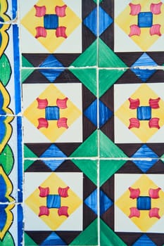 A vibrant azure and red textile Portugal pattern, showcasing creative arts through a symmetrical arrangement of rectangles and lines, with a mix of tints and shades for added visual interest
