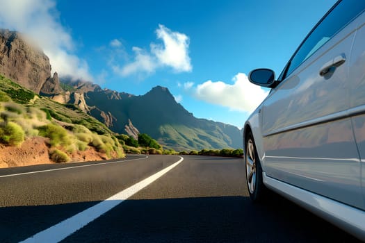 White car traveling with a mountain road at summer day. Neural network generated in January 2024. Not based on any actual scene or pattern.