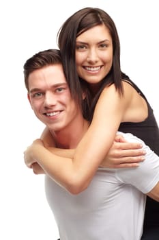 Portrait, couple and happy in studio with piggyback, love and romance in relationship. Partners, man and woman with smile or happiness, marriage and commitment or support on white background.