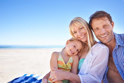 Family, beach and parents with kid for travel, holiday in Sydney for summer and happy together. Man, woman and young girl in portrait with ocean for adventure, trust and support with bonding outdoor.