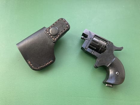 Revolver with holster for concealed carry of the weapons