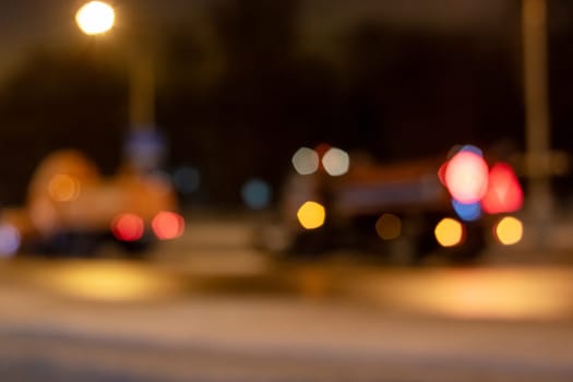 Bright red and yellow lights close up, blurred background