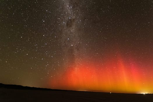 Photo of Southern Lights, or Aurora Australis, a stunning natural light display in the Southern Hemisphere, characterized by vibrant colors and patterns dancing in the night sky. Shot in Adelaide