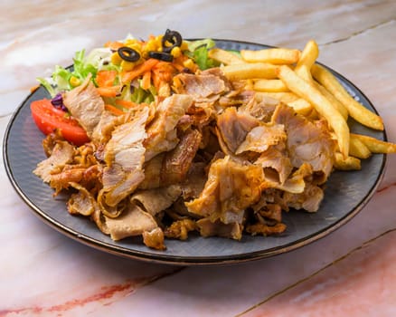 isolated view of a Turkish kebab combo platter,