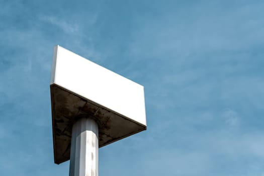 Blank open air billboard megaboard mock up in the city on sunny day