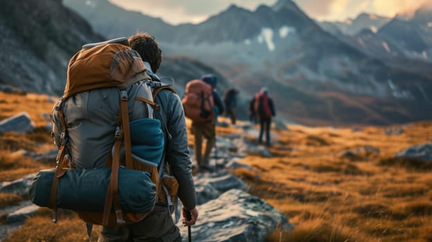 A bunch of backpackers are trekking up the majestic mountain, surrounded by the vast natural landscape, enjoying the sky, plants, and soil along the way. AIG41