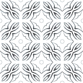 Textile ready stylish print, swimwear fabric, wallpaper, wrapping. Black and white likable boho chic summer design. Watercolor ikat repeating tile border. Ikat repeating swimwear design.