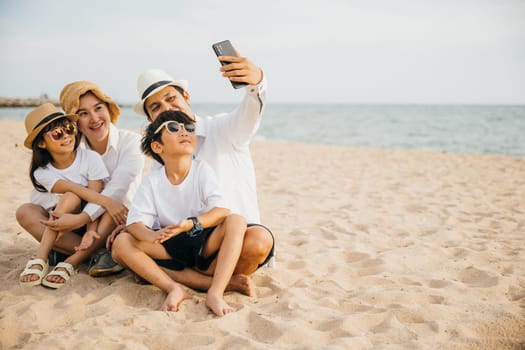 Summer joy on display as a happy family takes a lively selfie on the beach near the sea. Laughter smiles and the warmth of togetherness make this portrait a perfect capture of family happiness.