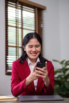 Happy business woman sitting and talking at work Job interview in front of laptop at home office.