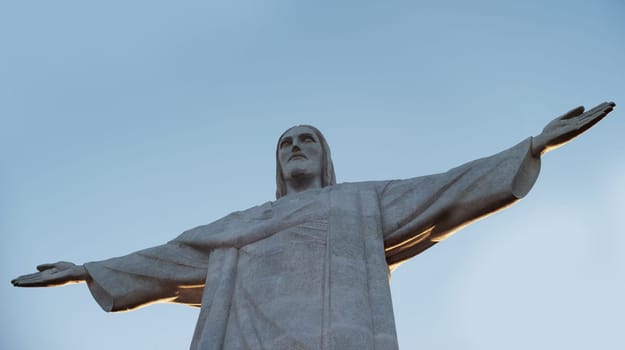 Jesus christ, statue and sculpture for travel and christian faith for art or religion journey. Hands, history monument or peace symbol for tourism attraction and spiritual landmark in rio de janeiro.