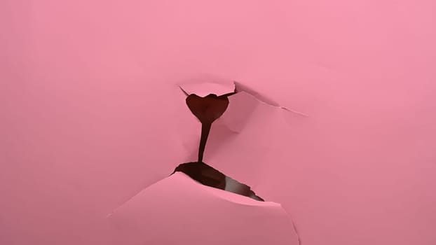 Torn pink paper background. Copy space