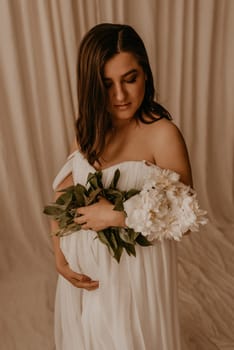 an incredibly beautiful married couple Expecting child, pregnant wife. Happy parenthood, real Ukrainian young family. romantic, gentle, stylish photo session of married couple. pregnant woman in love