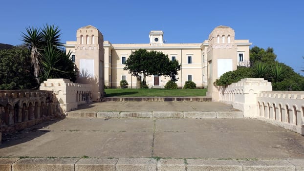 Asinara, Italy, August 11 2021. The main palace of Cala Reale during a summer morning.