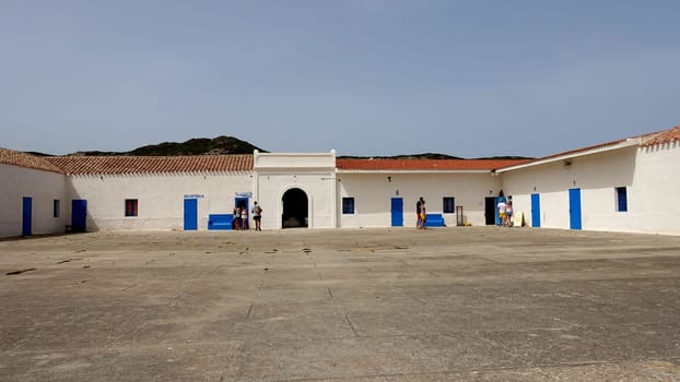 Asinara, Italy, August 11 2021. The courtyard of the old prison on the island during a summer morning.